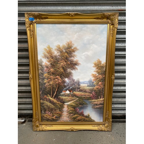 1248 - Oil on canvas Riverside painting in a Beautiful gold gilted frame 106cm x 75cm.