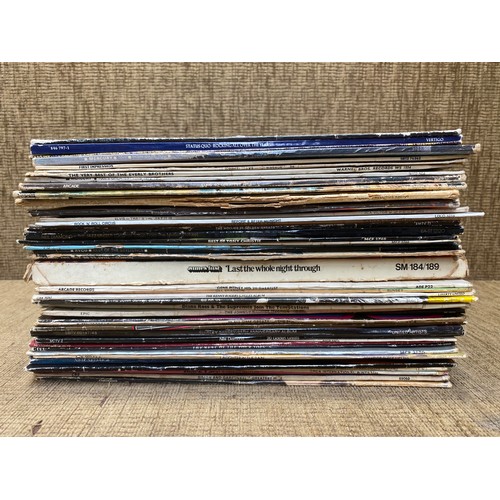 317 - Collection of vinyl LP records including 10cc, Status Quo and The Eagles.