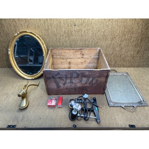 534 - Vintage items including a solid brass rams head, a Typhoo tea crate and a bevel edged mirror.