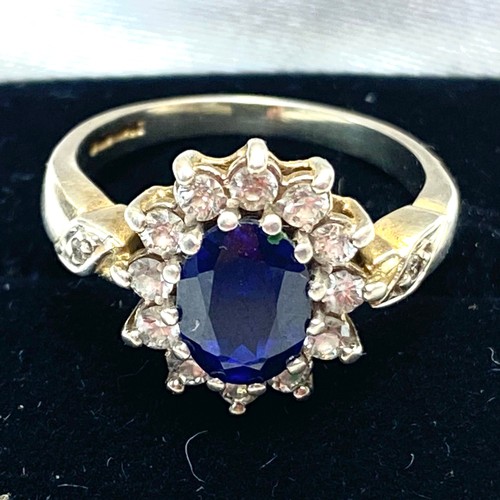 891 - 9ct white gold ring, Kyanite centre stone  with diamonds on the shoulders. Size M 3.5g.