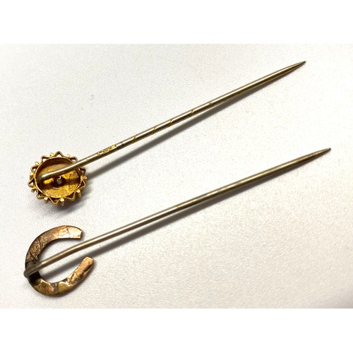 955 - Two Victorian stick pins with 9ct and 10ct heads.