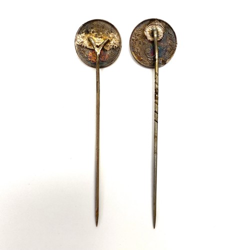 956 - Two antique Silver stick pins with silver three pence heads.