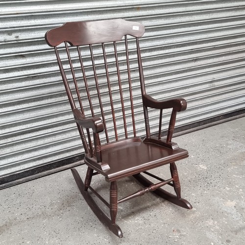 1051B - Vintage pine rocking chair.