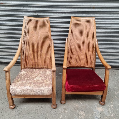 70 - Two oak and rattan chairs.