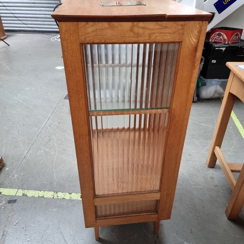 1058 - Solid oakand glass art deco style cabinet previously used in Wesley church Dowlais Merthyr Tydfil.