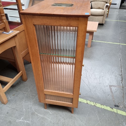 1058 - Solid oakand glass art deco style cabinet previously used in Wesley church Dowlais Merthyr Tydfil.