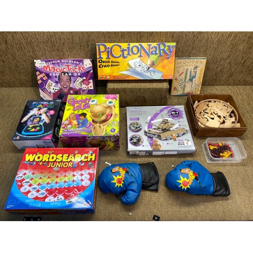 39 - Toys and games including Pictionary and Gooey Louie.