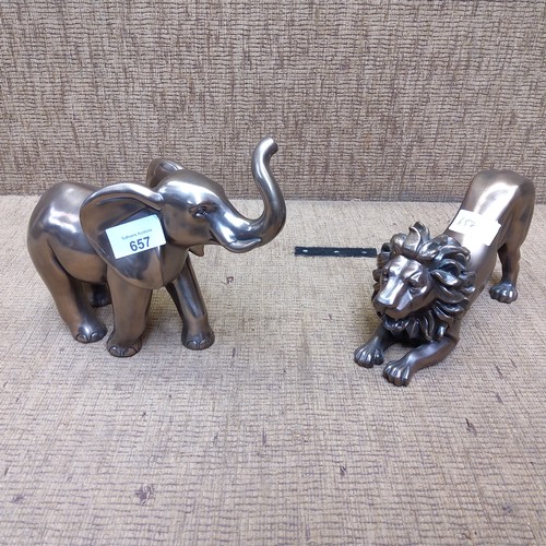 657 - Lion and elephant figures (20cmx18cm).