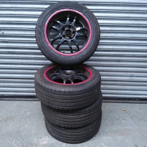 138 - four VW T4 alloy wheels and tyres (one rim damaged)