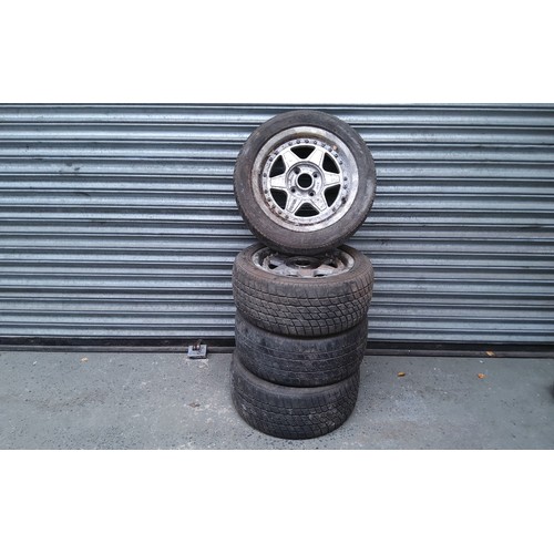 141 - four alloy wheels possibly from a Mk2 escort