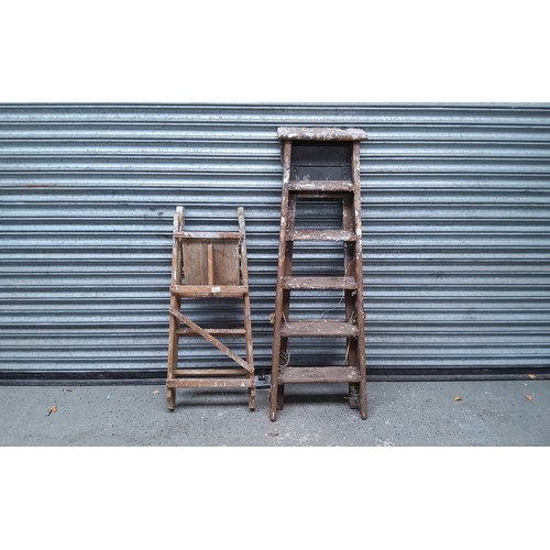 144 - two sets of wooden step ladders