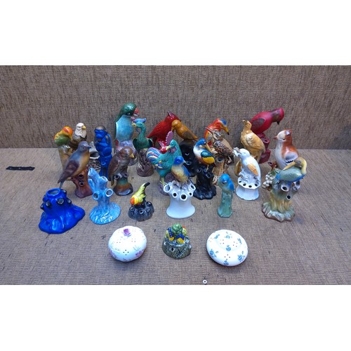 154 - Collection of bird figures including parrots.