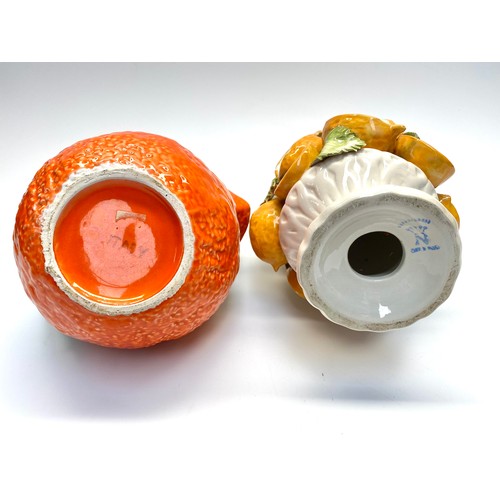 664 - Two italian ceramic pieces including majolica lemon tree (damaged) and orange shaped vintage pitcher... 