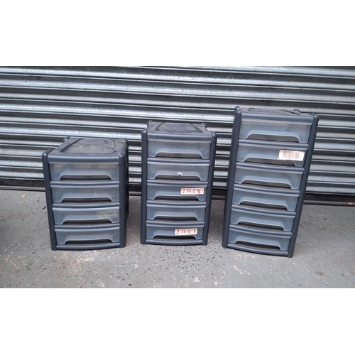 201 - Three sets of graduated plastic storage units