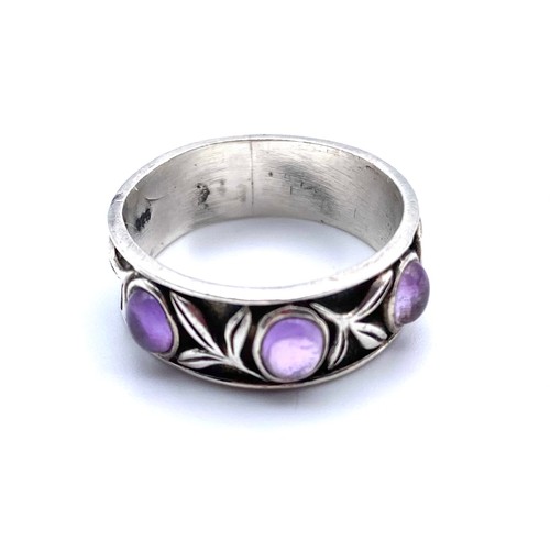 859 - Hand made silver ring with amethyst stones in an Art Nuevo style. size P.