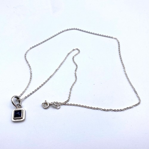 860 - Silver chain and handmade pendant with an Amethyst stone.