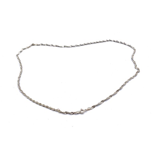 867 - Twisted silver necklace 60cm long.