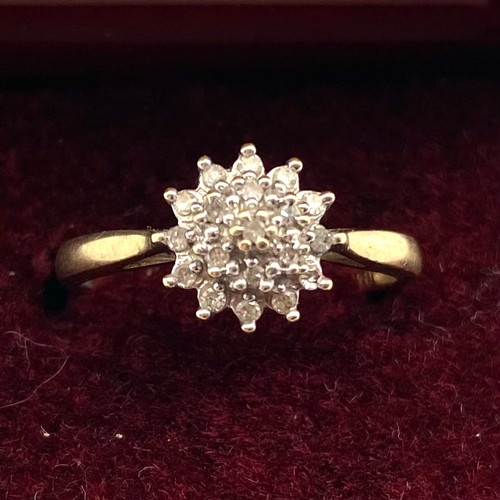 869 - 9ct gold and diamond cluster ring. Size K. 1.7g