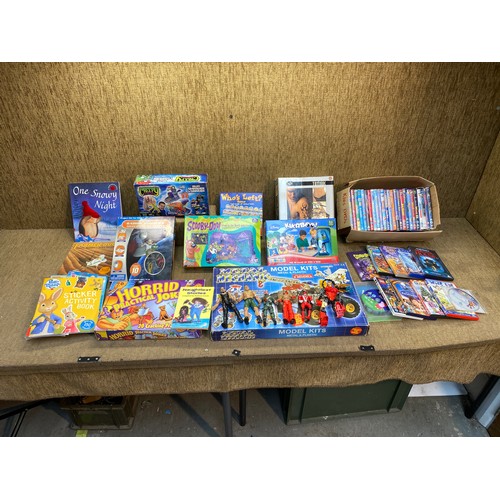 275 - Games, DVDs and figures including a Metal and plastic modeling kit and an Airbrush temporary Tattoo ... 