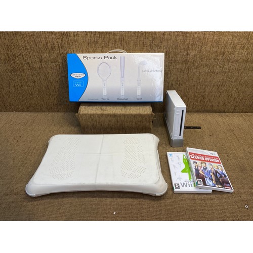 287 - Nintendo Wii console with Wii Fit board, Sports kit and 2 games.