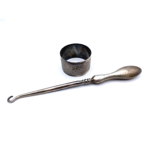 908 - Silver Napkin ring (27.3g) and Silver handled button hook.