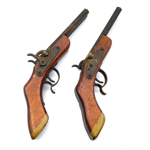 691 - Two vintage replica dualling pistols.