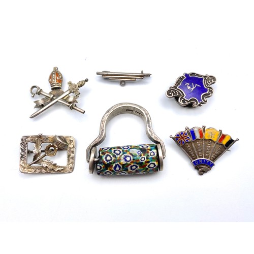920 - Five silver and enamel badges and an interesting silver Millefiori item?