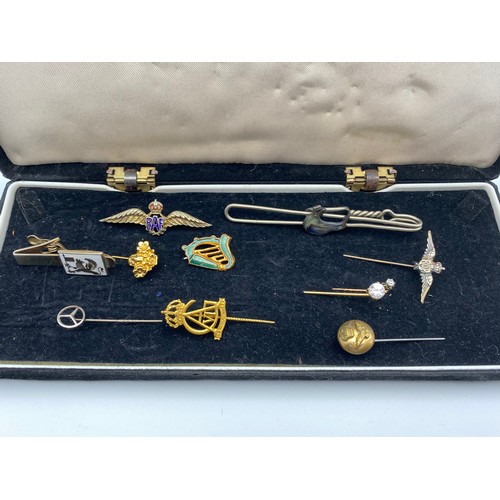 943 - Collection of dress accessories including RAF sweetheart brooches, Vauxhall tie clip and Mercedes ti... 