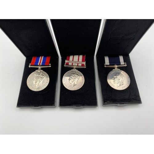 959 - Three medals, Naval GSM with Palestine bar, War medal and Naval LSGC awarded to J51338 Leading Seama... 