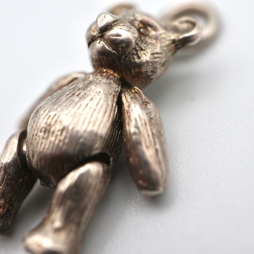 919 - Four silver charms, including two that are articulated, teddy bear alligator, in a wooden box with s... 