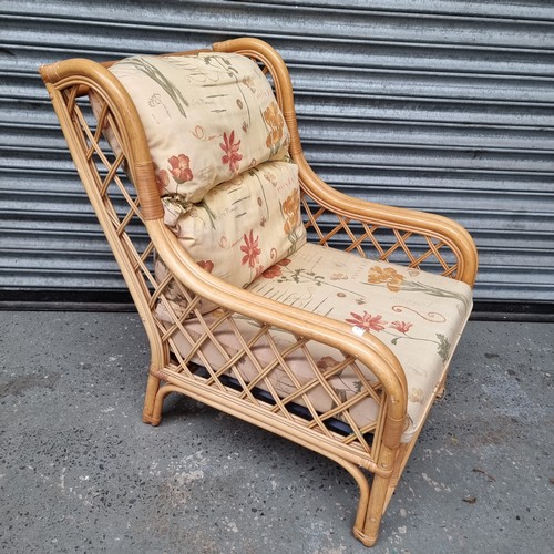 23 - Bent Wood bamboo and Wicker conservatory chair with a Spanish themed upholstery cushion.