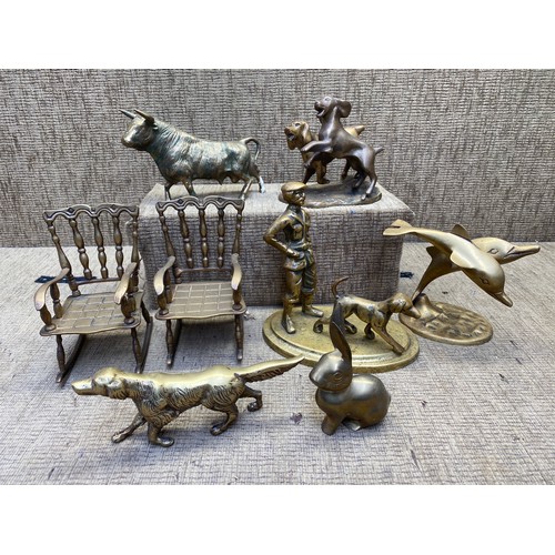 459 - Sold brass items and statues including raging bull and dolphins.