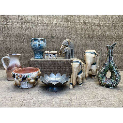 460 - Household items including graduated elephants and west German pottery.