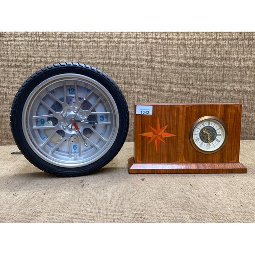 1042 - Two interesting clocks.One in the style of a car tire and one machinal Herman mace Mercedei mantle c... 