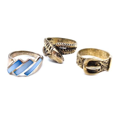 1237 - 3 silver rings including Two silver buckle rings and a snake ring sizes R, P and X.