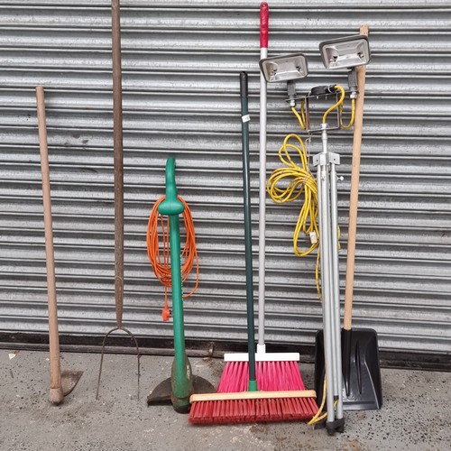 439 - Quantity of garden tools including brushes and a tripod spotlight.