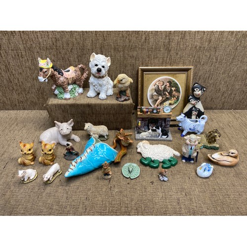 76 - Selection of various animals made from resin, stone and ceramic.
