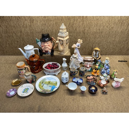 80 - Porcelain and ceramic figures,teapots ,character jugs including Staffordshire fine ceramics and Roya... 