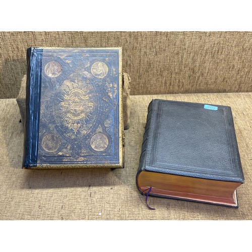 1058B - Two Antique Welsh bibles leather bound one with brass latches.