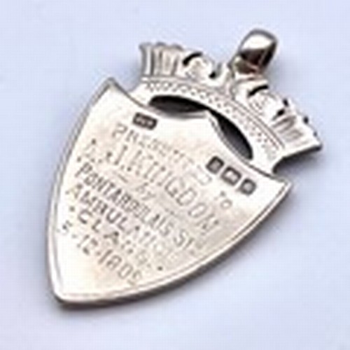 1255 - Sterling silver and gold fob.