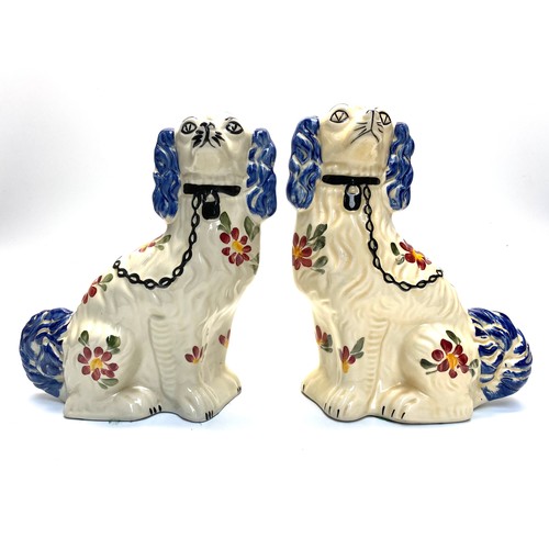 1067 - Pair of hand-painted Stiltone Pottery Staffordshire fireside dogs 32cm tall.