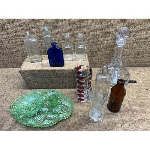 136 - Selection of collectable glass bottles and a lead crystal decanter.