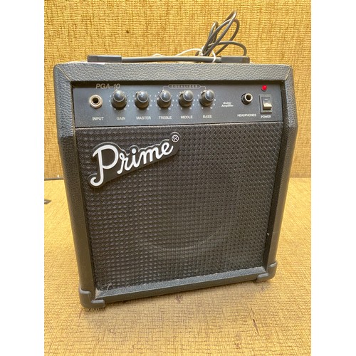 143 - Prime PGA-10 guitar amplifier with leads.