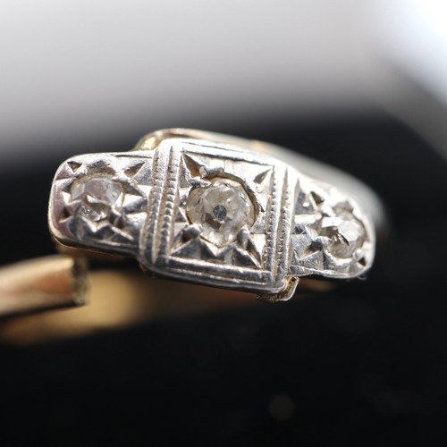 1259 - 18ct gold ring with CZ stones size H 1.6 grams.