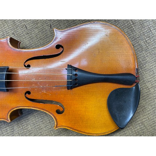 1091 - Reproduction Stradivarius Violin in a leather case.