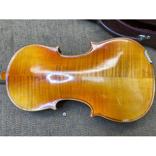 1091 - Reproduction Stradivarius Violin in a leather case.