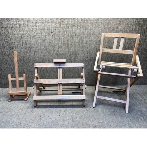 149 - Two wooden artists easels and foldable childrens stool.