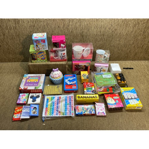 163 - Selection of boxed games, toy's and collectable retail packaged cups.