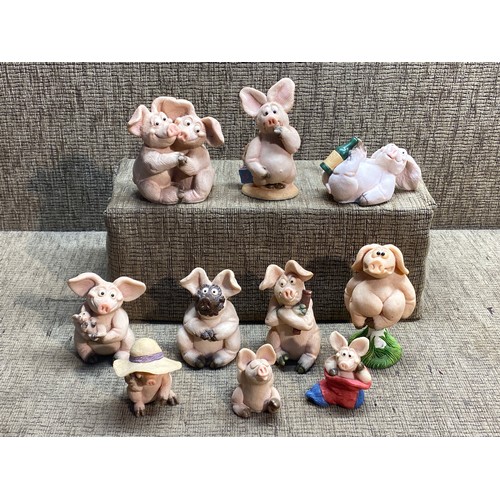 166 - Selection of collectable Piggins statues.