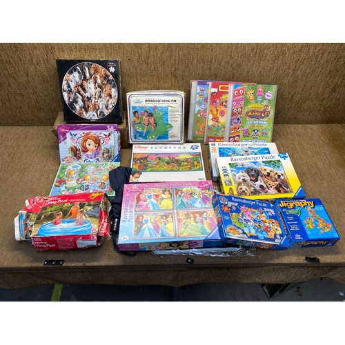 176 - Selection of jigsaws Two swimming pools and collection of Moshi monster cards.